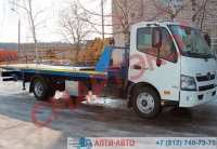 Купить эвакуатор со сдвижной платформой Hino 300 3 тонны в Санкт-Петербурге